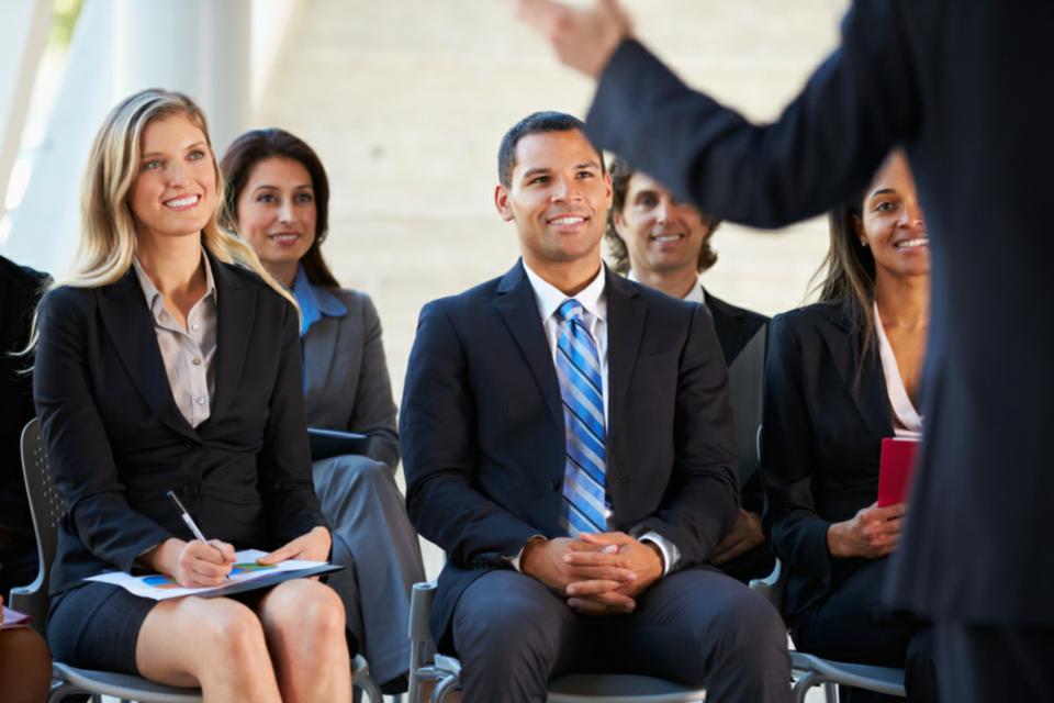 Employees listening to a customized keynote presentation